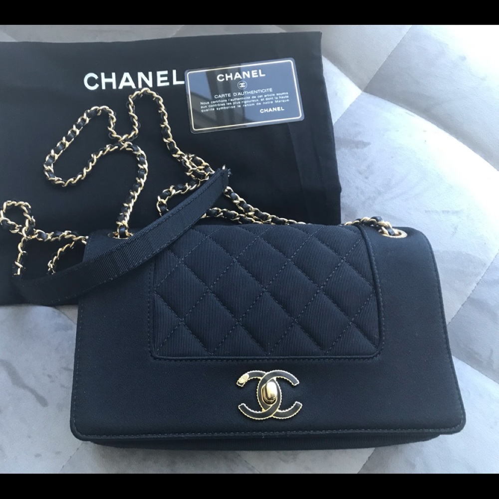 Satin Black Flap Chanel Purse.